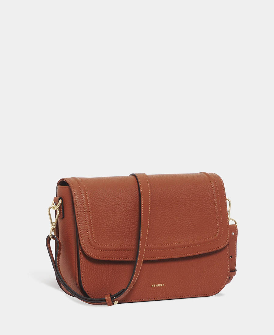 A tan leather crossbody bag